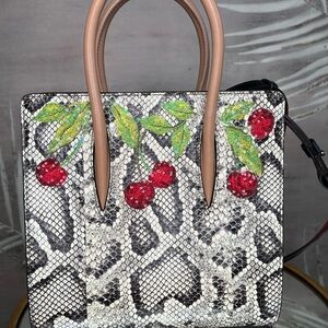 Christian Loubutin python leather luxury bag LIMITED EDITION